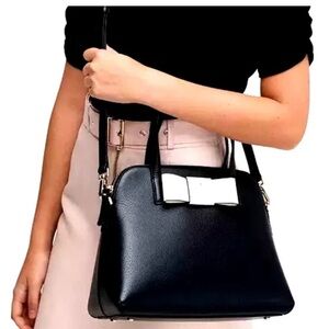 Brand new Kate Spade black bowler bag with white bow.